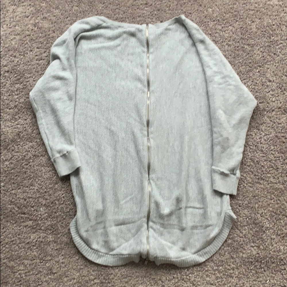 Quarter length grey sweater